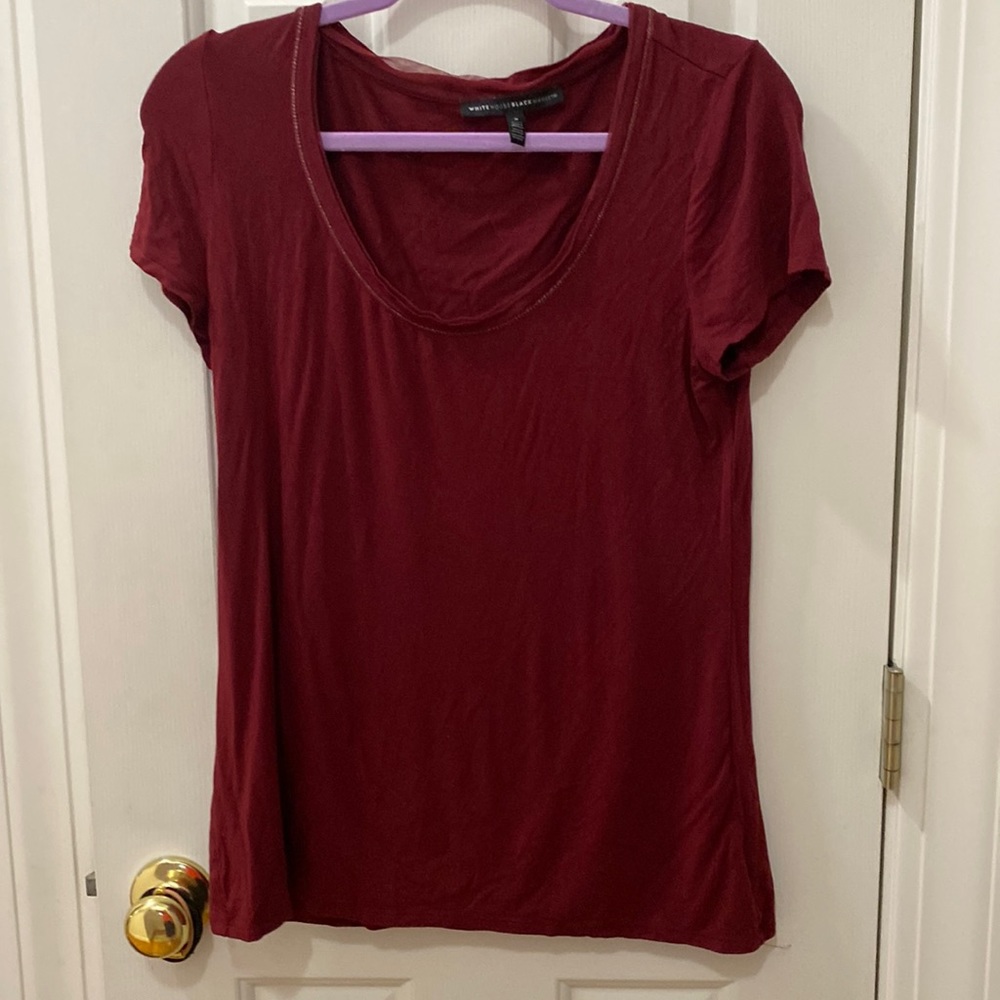 White House Black market go on a colored shirt, slight glitter neckline
